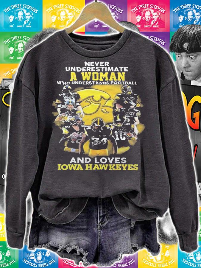 Never underestimate a woman who understands football and loves Iowa Hawkeyes shirt t-shirt